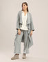 Coat with draped collar
